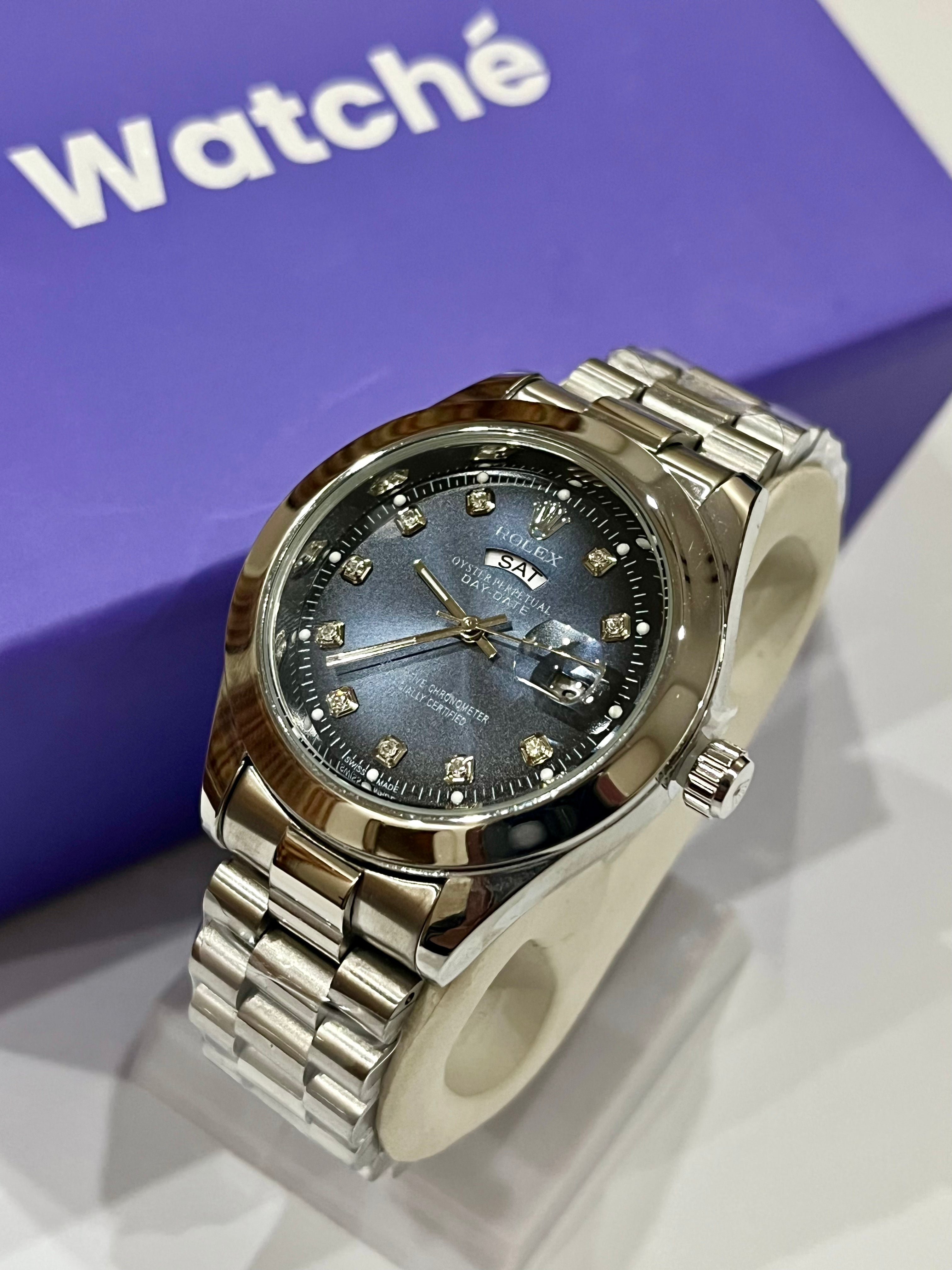 Rolex Day & Date - Silver With Patrick Blue Dial